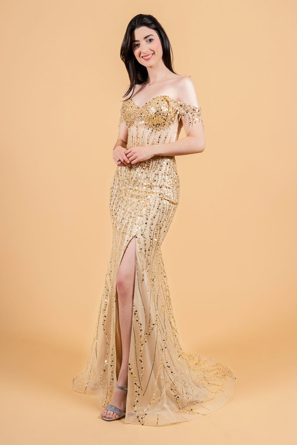 A large amount of beads and sequins decorate the corset bust and leads out  GL3620 GLS BY ELIZABETH K