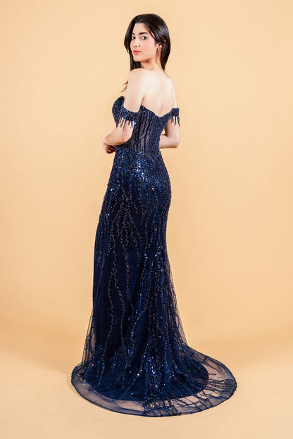 A large amount of beads and sequins decorate the corset bust and leads out  GL3620 GLS BY ELIZABETH K